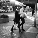 Couple under the Acme sign